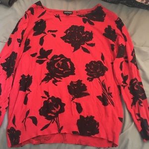 Red sweater with black flowers